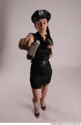 NIKITA POLICEWOMAN WITH TWO GUNS